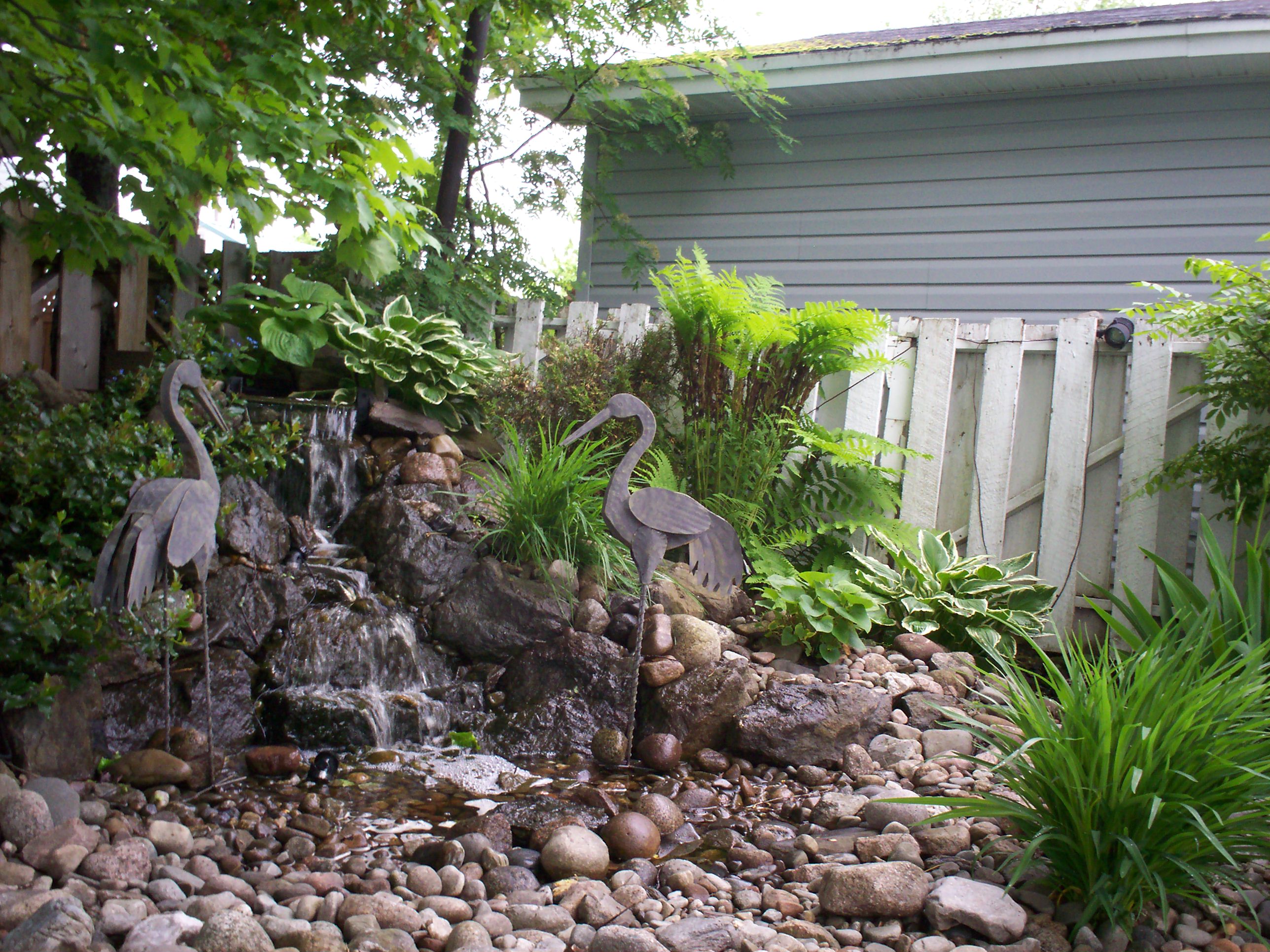 Stone fountain detail showing natural stonework and water feature